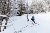 Couple de skieurs sur une piste de ski nordique au Grand-Bornand