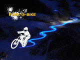 funk_e_bike_descente_aux_flambeaux_soiree_vtt_electrique_sur_neige_piste_nocturne_grand_bornand.jpg